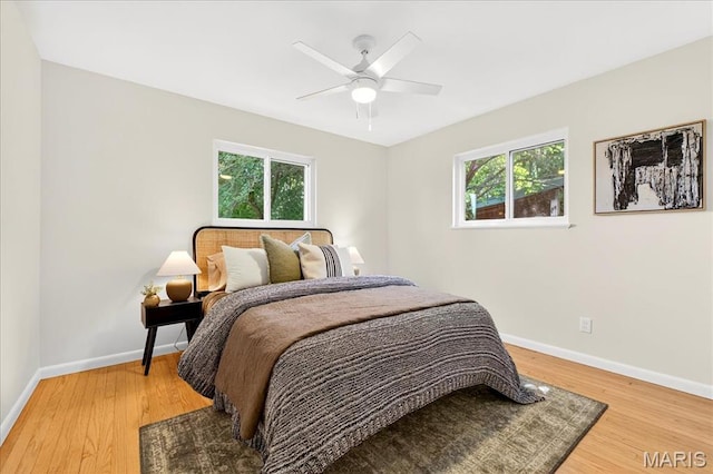265 Francisca Dr, Florissant, MO 63031 - bedroom with light wood-style floors and a ceiling fan
