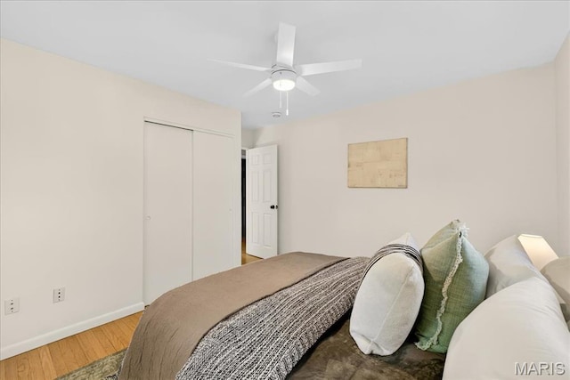 265 Francisca Dr, Florissant, MO 63031 - bedroom with wood finished floors, a closet, and ceiling fan