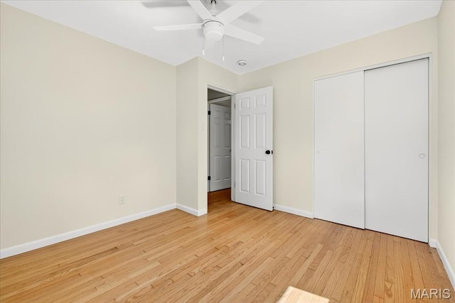 265 Francisca Dr, Florissant, MO 63031 - unfurnished bedroom featuring light wood-style flooring, a closet, and ceiling fan
