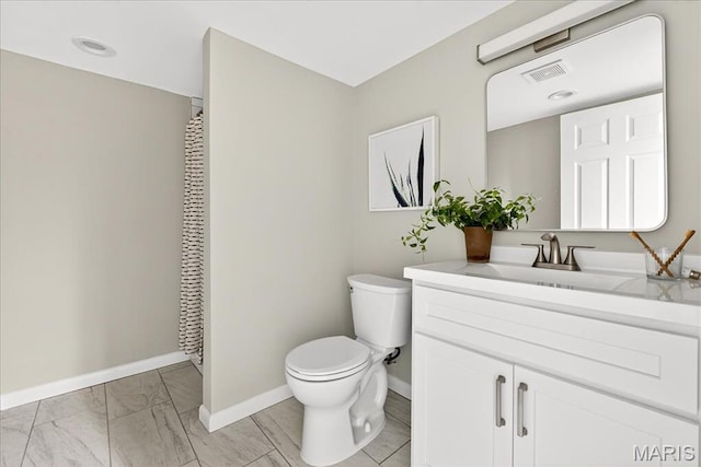 265 Francisca Dr, Florissant, MO 63031 - bathroom with vanity and marble look tile flooring