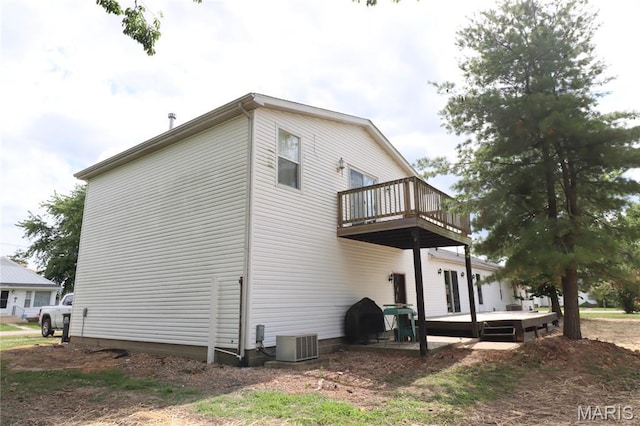 1001 E 2nd St, Saint Peter, IL 62880 - view of property exterior with a balcony and a wooden deck