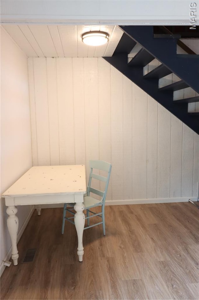 1001 E 2nd St, Saint Peter, IL 62880 - unfurnished dining area with light wood finished floors and baseboards