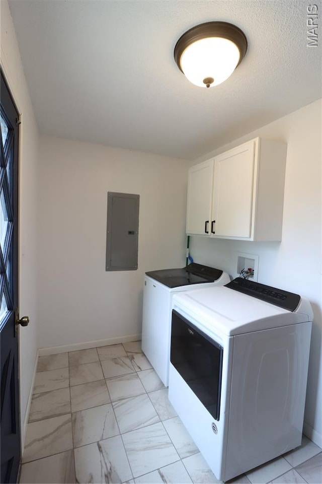 1001 E 2nd St, Saint Peter, IL 62880 - laundry area with electric panel, cabinet space, independent washer and dryer, and light marble finish flooring