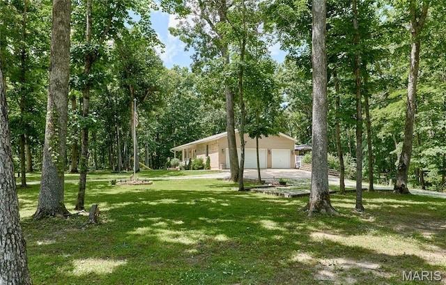 1939 N Rock Church Rd, Troy, MO 63379 - view of green lawn featuring a garage