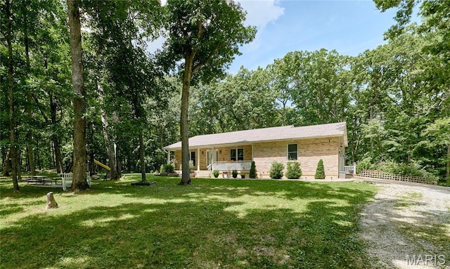 1939 N Rock Church Rd, Troy, MO 63379 - ranch-style home featuring a front yard, gravel driveway, and brick siding