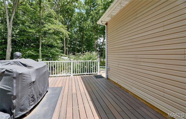 1939 N Rock Church Rd, Troy, MO 63379 - deck with view of scattered trees and area for grilling