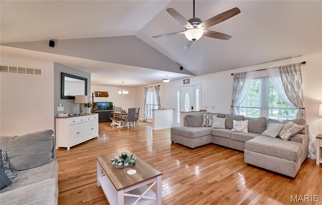 1939 N Rock Church Rd, Troy, MO 63379 - living area with ceiling fan, light wood-style floors, and high vaulted ceiling