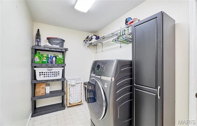 1939 N Rock Church Rd, Troy, MO 63379 - laundry room with washer / clothes dryer, light floors, and cabinet space