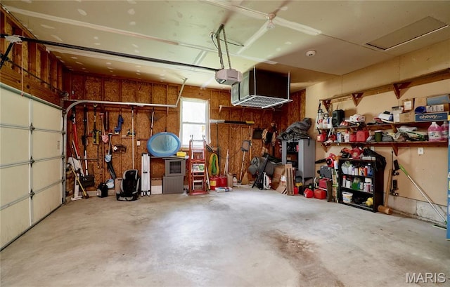 1939 N Rock Church Rd, Troy, MO 63379 - garage featuring a garage door opener
