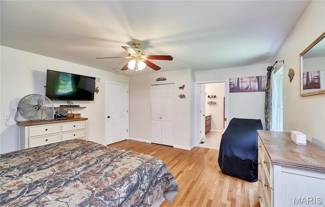 1939 N Rock Church Rd, Troy, MO 63379 - bedroom with light wood-style floors, a ceiling fan, and ensuite bathroom