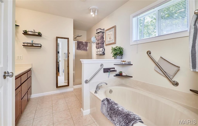 1939 N Rock Church Rd, Troy, MO 63379 - bathroom featuring a shower stall, a garden tub, vanity, and tile patterned flooring