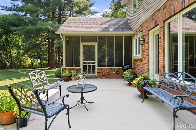 4 Cheshire Ct, Edwardsville, IL 62025 - view of patio with a sunroom