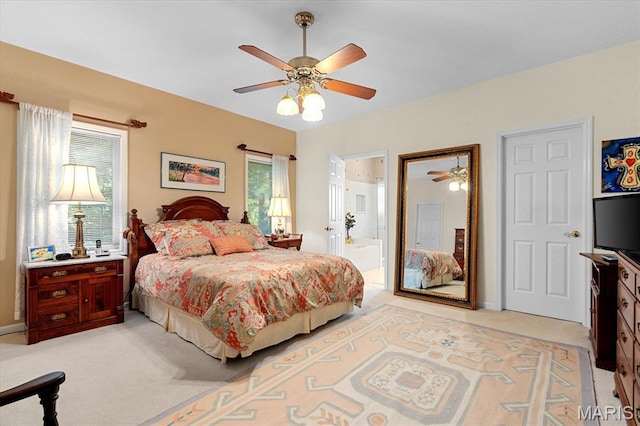 4 Cheshire Ct, Edwardsville, IL 62025 - bedroom with light carpet, ceiling fan, and ensuite bathroom