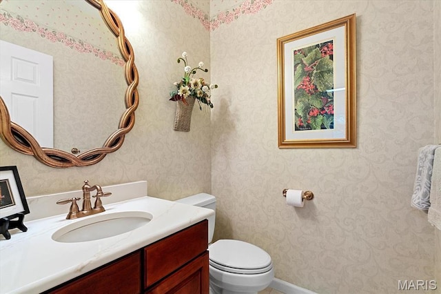 4 Cheshire Ct, Edwardsville, IL 62025 - half bathroom featuring vanity and wallpapered walls