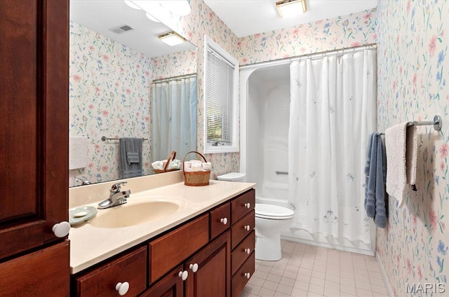 4 Cheshire Ct, Edwardsville, IL 62025 - full bath with wallpapered walls, tile patterned floors, vanity, and shower / bath combo with shower curtain