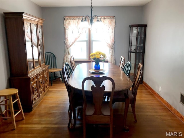 103 Maupin Ave, New Haven, MO 63068 - dining space featuring light wood finished floors and a chandelier