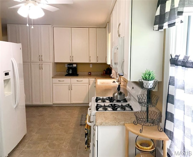 103 Maupin Ave, New Haven, MO 63068 - kitchen featuring white appliances, ceiling fan, light countertops, white cabinets, and light tile patterned floors