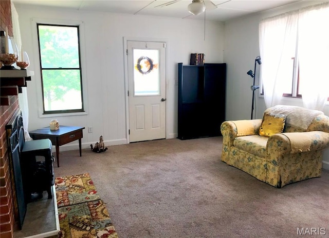 103 Maupin Ave, New Haven, MO 63068 - living room featuring plenty of natural light, carpet, a fireplace, and ceiling fan