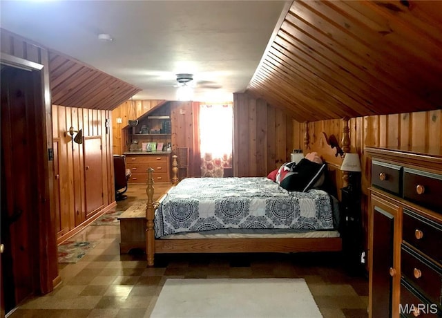 103 Maupin Ave, New Haven, MO 63068 - bedroom featuring tile patterned floors, wooden walls, and vaulted ceiling