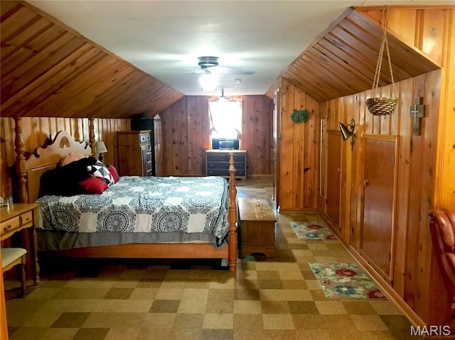103 Maupin Ave, New Haven, MO 63068 - bedroom with tile patterned floors, wooden walls, and vaulted ceiling