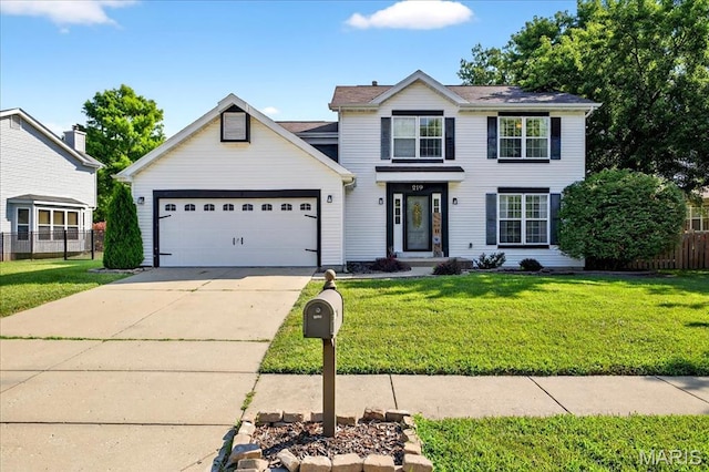 219 Royalltrail Ln, Saint Charles, MO 63368 - traditional home featuring a garage and driveway