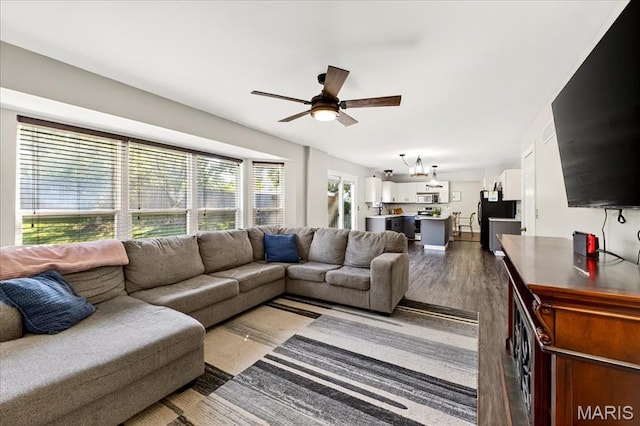 219 Royalltrail Ln, Saint Charles, MO 63368 - living area featuring ceiling fan and dark wood finished floors