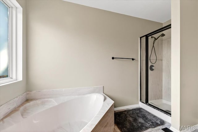 219 Royalltrail Ln, Saint Charles, MO 63368 - bathroom with a garden tub and a stall shower