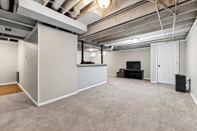 219 Royalltrail Ln, Saint Charles, MO 63368 - below grade area with carpet flooring and baseboards