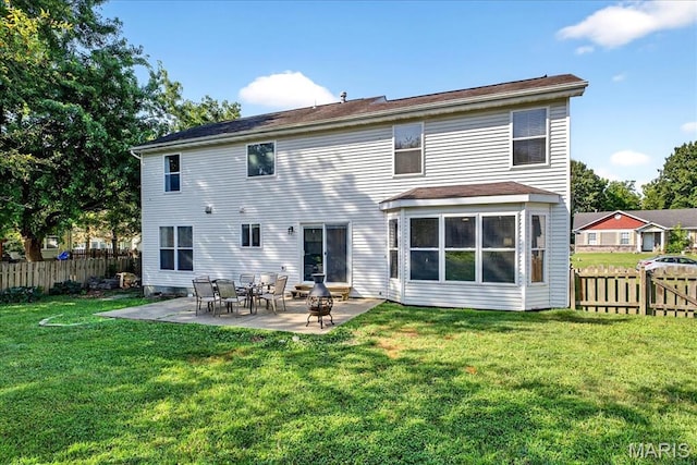219 Royalltrail Ln, Saint Charles, MO 63368 - rear view of house featuring a fenced backyard and a patio