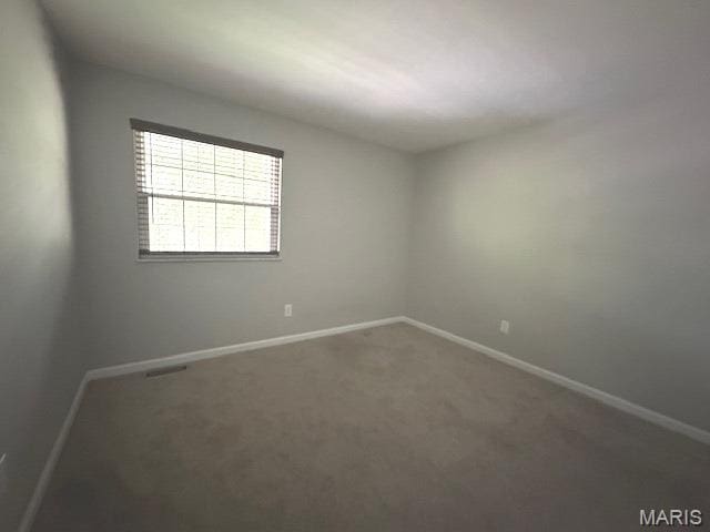 12750 Needle Point Ct, Florissant, MO 63033 - unfurnished room featuring baseboards and carpet flooring