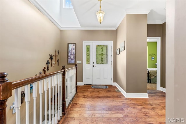 318 Doe Run Ln, Bonne Terre, MO 63628 - foyer entrance with wood-type flooring and crown molding