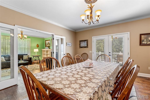 318 Doe Run Ln, Bonne Terre, MO 63628 - dining area featuring a chandelier, french doors, crown molding, and hardwood / wood-style floors