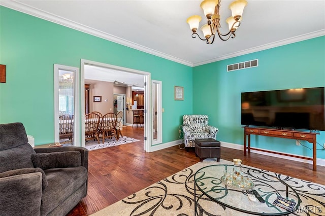 318 Doe Run Ln, Bonne Terre, MO 63628 - living area featuring a chandelier, crown molding, and wood finished floors