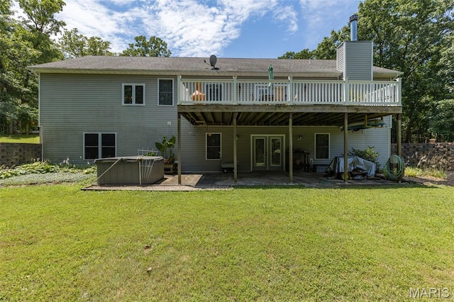 318 Doe Run Ln, Bonne Terre, MO 63628 - back of property featuring a hot tub, a deck, a patio, and a yard