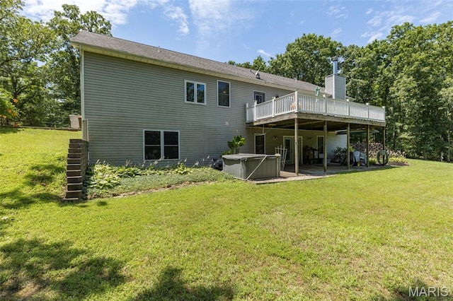 318 Doe Run Ln, Bonne Terre, MO 63628 - rear view of property with a hot tub, a wooden deck, a yard, a chimney, and a patio area