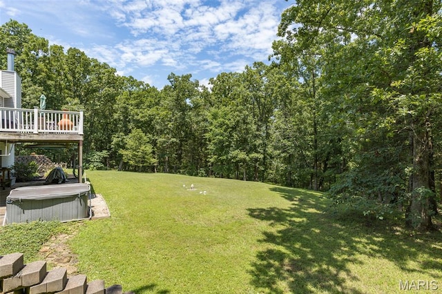318 Doe Run Ln, Bonne Terre, MO 63628 - view of grassy yard with a hot tub and a deck