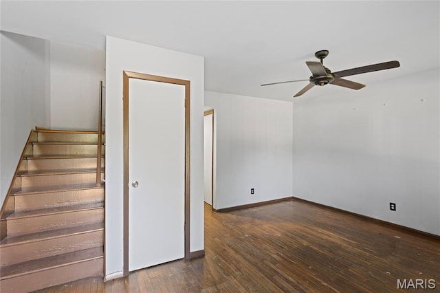 2239 University St, Saint Louis, MO 63107 - unfurnished room featuring a ceiling fan, wood-type flooring, and stairway