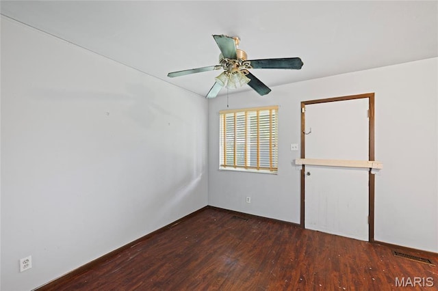 2239 University St, Saint Louis, MO 63107 - empty room featuring wood finished floors and a ceiling fan