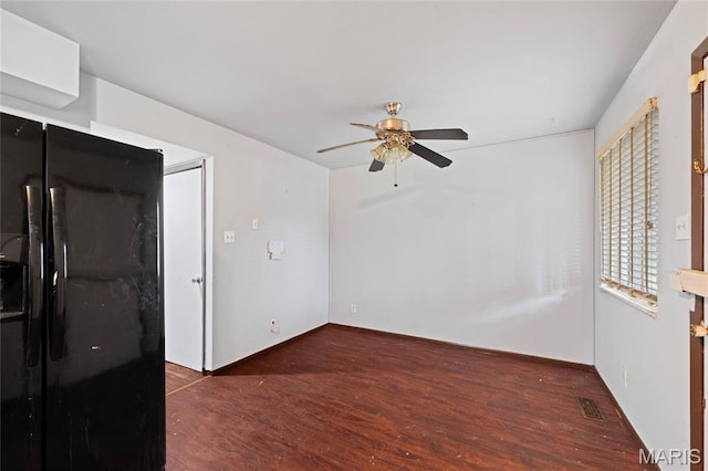 2239 University St, Saint Louis, MO 63107 - unfurnished room featuring ceiling fan and wood finished floors