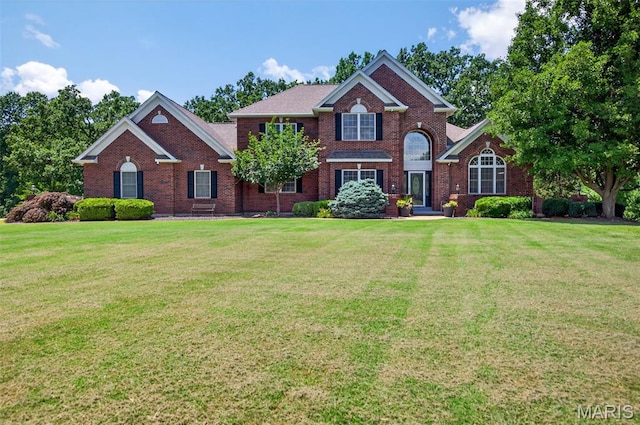 156 Bluffview Dr, Troy, MO 63379 - view of front of property featuring brick siding and a front yard