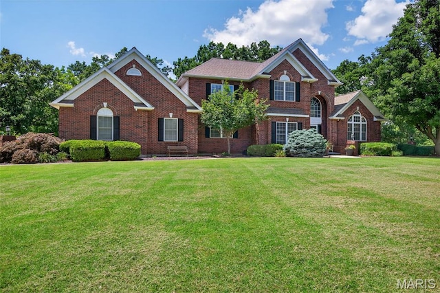 156 Bluffview Dr, Troy, MO 63379 - view of front of property with brick siding and a front yard