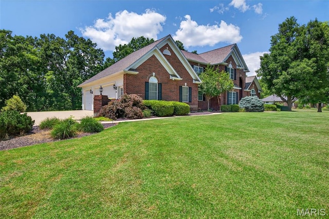 156 Bluffview Dr, Troy, MO 63379 - view of front of property featuring brick siding, an attached garage, a front yard, and driveway