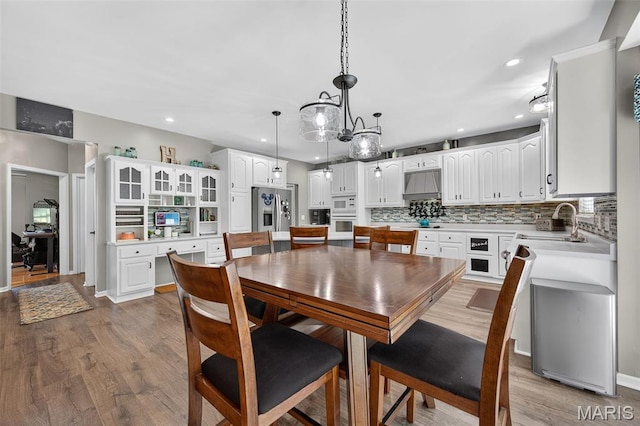 156 Bluffview Dr, Troy, MO 63379 - dining room featuring wood finished floors and recessed lighting