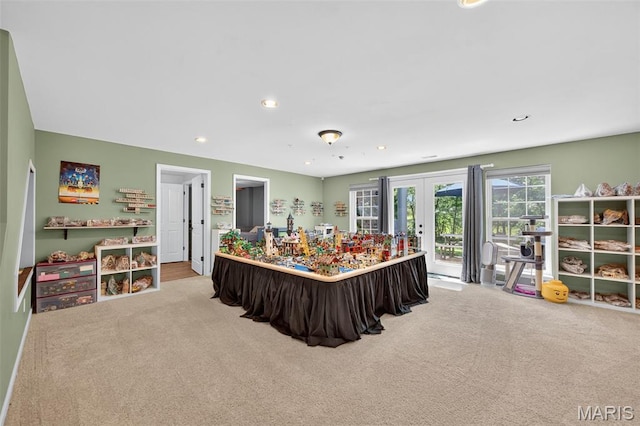 156 Bluffview Dr, Troy, MO 63379 - rec room featuring french doors, carpet flooring, and recessed lighting