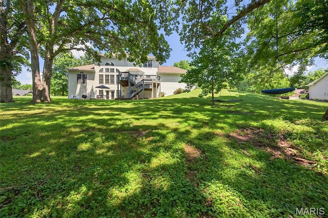 156 Bluffview Dr, Troy, MO 63379 - view of grassy yard with stairway and a deck