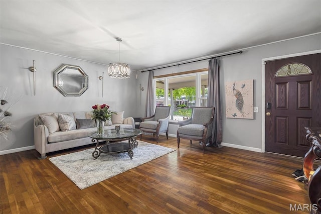 1326 Petite Dr, Saint Louis, MO 63138 - living area with a chandelier and dark wood-type flooring