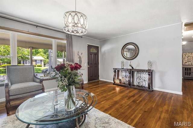 1326 Petite Dr, Saint Louis, MO 63138 - living room featuring a chandelier and hardwood / wood-style flooring