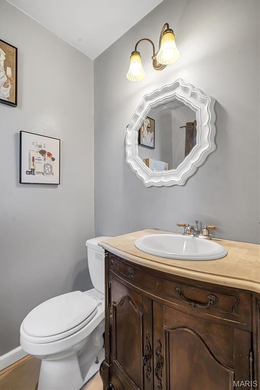 1326 Petite Dr, Saint Louis, MO 63138 - half bathroom featuring vanity and toilet
