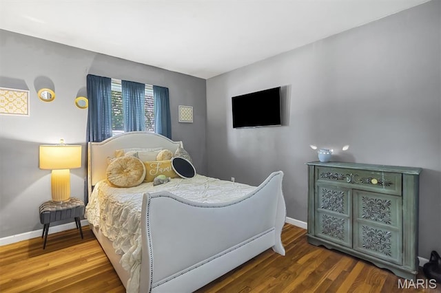 1326 Petite Dr, Saint Louis, MO 63138 - bedroom featuring wood finished floors and baseboards