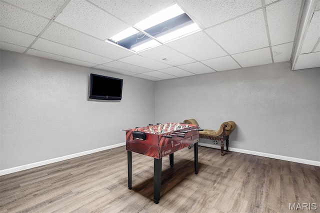 1326 Petite Dr, Saint Louis, MO 63138 - recreation room featuring a paneled ceiling and wood finished floors